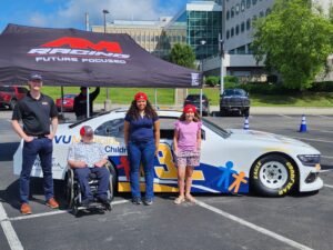 WVU Medicine Children's and AM Racing's Christian Rose partner for child-designed art project to promote WVUMC